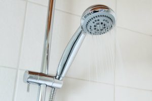 water coming out of shower head, water pressure