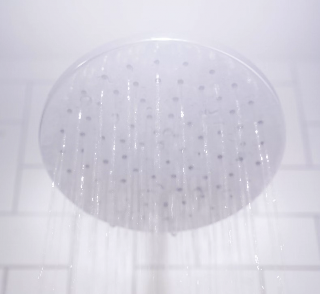 a close up of shower head